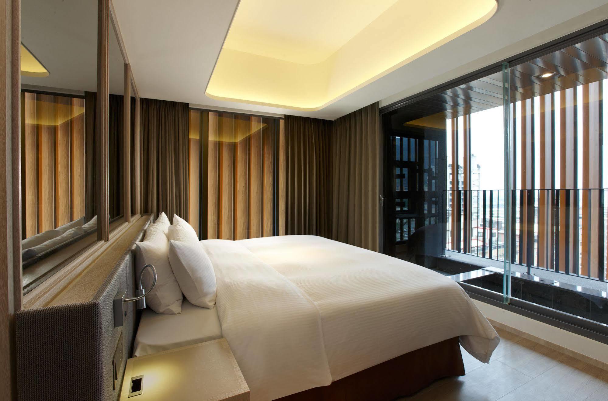 礁溪晶泉丰旅 Wellspring By Silks Jiaoxi Hotel Exterior foto A bedroom at The Hari